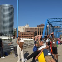 Group of students on Blue Bridge with exhausting funny faces